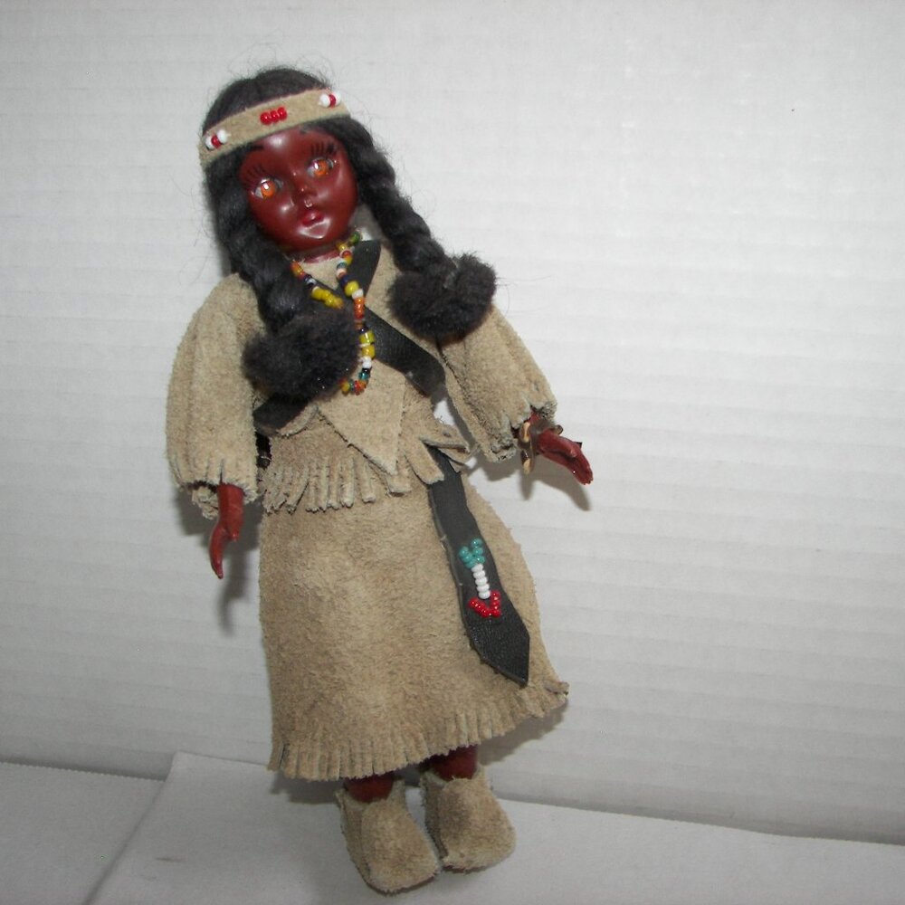 American Indian squaw with papoose fringed suede clothing bead decorations
